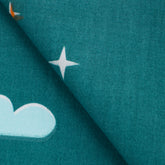 PRINTED COTTON POPLIN FABRIC - STARS AND CLOUDS ON TURQUOISE BACKGROUND - 125 GSM