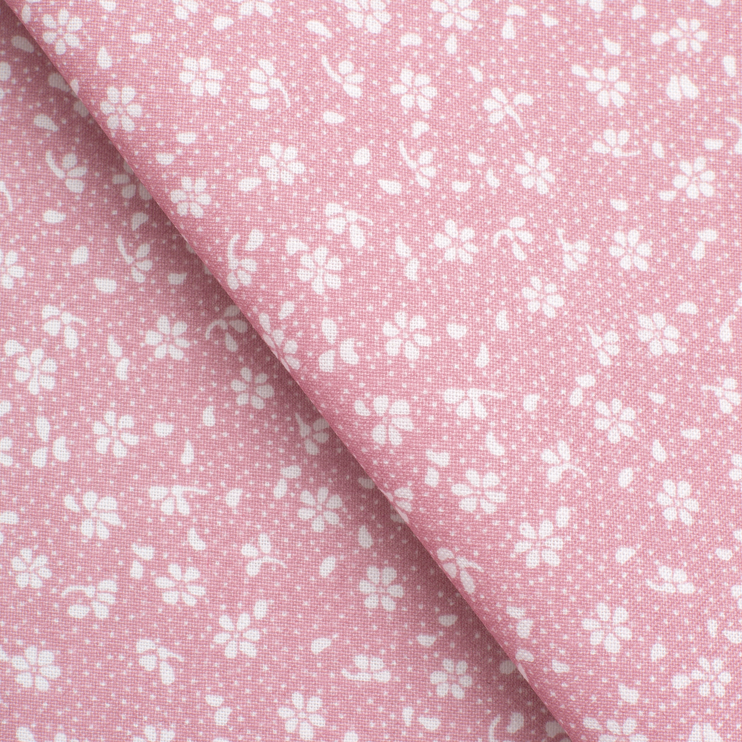 PRINTED COTTON POPLIN FABRIC - SMALL WHITE FLOWERS ON PINK BACKGROUND - 160 GSM