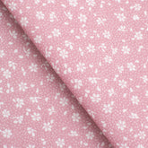 PRINTED COTTON POPLIN FABRIC - SMALL WHITE FLOWERS ON PINK BACKGROUND - 160 GSM