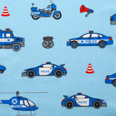 PRINTED COTTON POPLIN FABRIC - POLICE VEHICLES ON BLUE BACKGROUND - 160 GSM