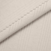 COTTON POINTELLE KNIT FABRIC - CABLE KNIT AND PAW PRINT BEIGE PATTERN - 150 GSM