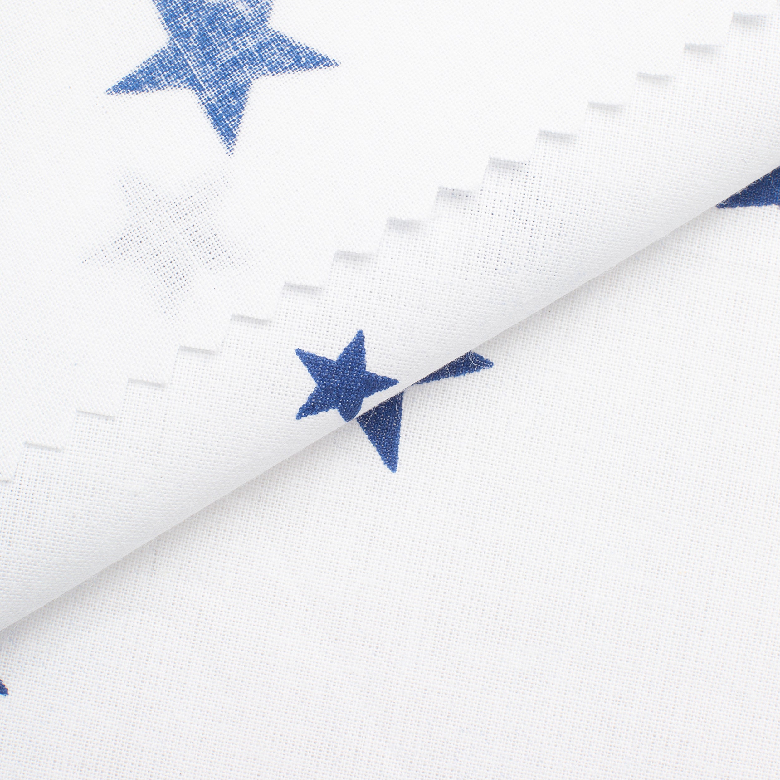 PRINTED COTTON POPLIN FABRIC - BLUE STARS ON WHITE BACKGROUND - 160 GSM
