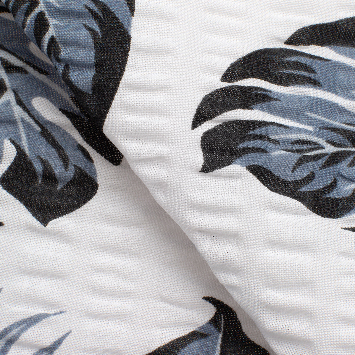PRINTED COTTON SEERSUCKER FABRIC - MONSTERA LEAVES PRINT - 160 GSM