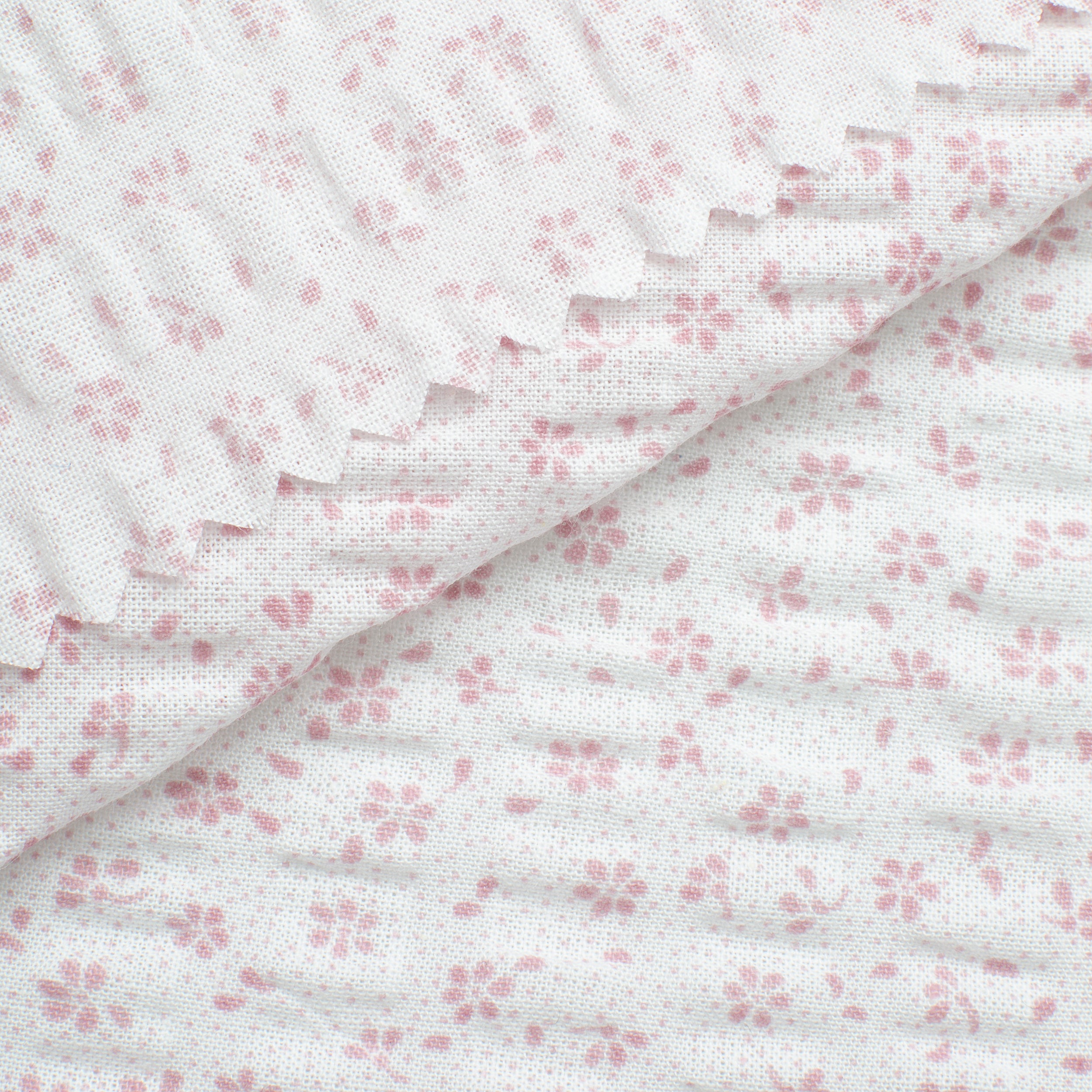 PRINTED COTTON SEERSUCKER FABRIC - SMALL PINK FLOWERS ON WHITE BACKGROUND - 160 GSM