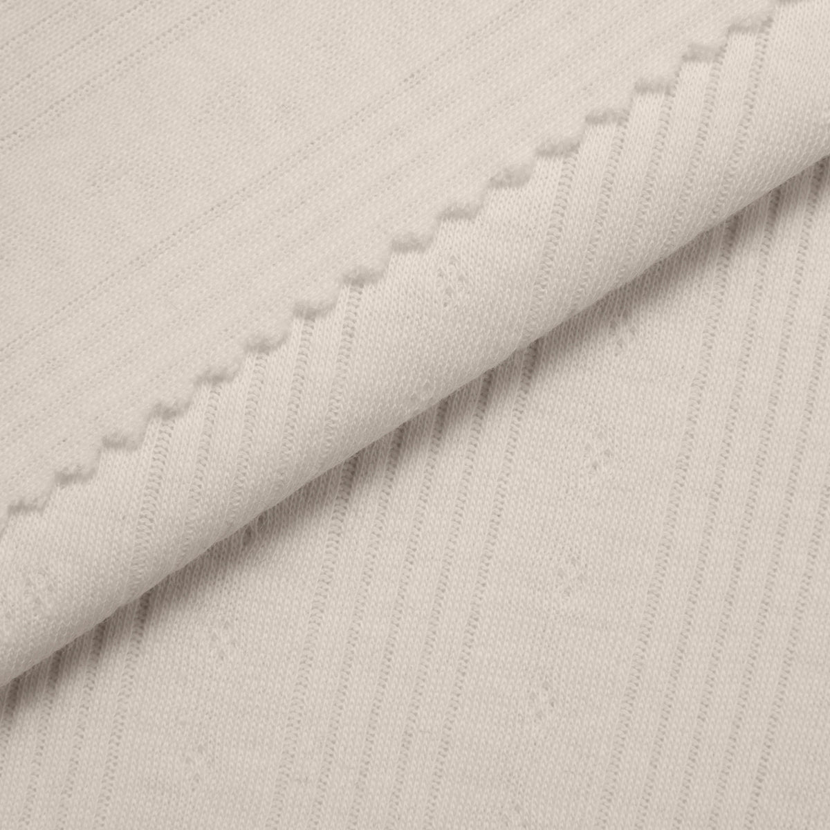 COTTON POINTELLE KNIT FABRIC - CABLE KNIT AND PAW PRINT BEIGE PATTERN - 150 GSM